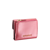 "Serpenti Forever" slim compact wallet in Blush Quartz pink calf leather with a varnished and pearled effect and black calf leather. Tempting gold plated brass snakehead stud closure, finished with matte Blush Quartz pink enamel, and black enamel eyes. SEA-SLIMCOMPACT-VCLa image 3