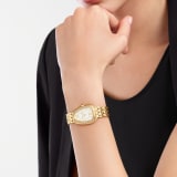 Serpenti Seduttori watch with 18 kt yellow gold case, 18 kt yellow gold bracelet, 18 kt yellow gold bezel set with diamonds and a white silver opaline dial. 103942 image 1