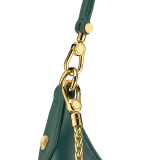 Serpenti Ellipse medium shoulder bag in Urban grain and smooth ivory opal calf leather with flamingo quartz pink grosgrain lining. Captivating snakehead closure in gold-plated brass embellished with black onyx scales and red enamel eyes. 1190-UCL image 5