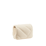 Serpenti Cabochon micro bag in ivory opal calf leather with a maxi matelassé pattern and black nappa leather lining. Captivating snakehead closure in gold-plated brass embellished with red enamel eyes. SCB-NANOCABOCHONa image 3