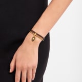 Serpenti Forever bracelet in chestnut opal braided calf leather and gold-plated brass chain with magnetic clasp closure. Captivating snakehead charm with black enamel and gold-plated scales, and black enamel eyes. SERP-BRAID-CHAIN-chestopal image 1