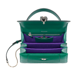 “Serpenti Forever” top handle bag in emerald green calf leather. Iconic snake head closure in light gold-plated brass enhanced with black and white agate enamel and green malachite eyes. 1050-CL image 3