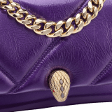 Serpenti Cabochon Maxi Chain mini crossbody bag in vivid amethyst purple calf leather with graphic maxi quilted motif and emerald green nappa leather lining. Captivating magnetic snakehead closure in light gold-plated brass embellished with dark grey hematite scales and red enamel eyes. 292886 image 5