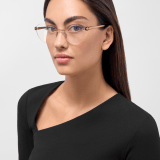 Serpenti Forever metal cat-eye glasses with enamelled snakehead embellishment on the temples 904367 image 1