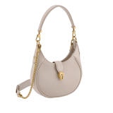 Serpenti Ellipse small crossbody bag in Urban grain and smooth flamingo quartz pink calf leather with flamingo quartz pink gros grain lining. Captivating snakehead closure in gold-plated brass embellished with black onyx scales and red enamel eyes. Online exclusive colour. 1204-UCLa image 2