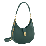 Serpenti Ellipse medium shoulder bag in Urban grain and smooth ivory opal calf leather with flamingo quartz pink grosgrain lining. Captivating snakehead closure in gold-plated brass embellished with black onyx scales and red enamel eyes. 1190-UCL image 2