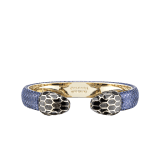 "Serpenti Forever" bangle in metallic Midnight Sapphire blue karung skin with light gold-plated brass details. Iconic face-to-face snakeheads with black and glittery Hawk's Eye grey enamel and seductive black enamel eyes. SPContr-MK-MidSapph image 1
