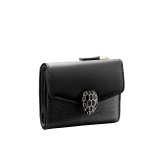 "Serpenti Forever" slim compact wallet in black calf leather and black goatskin. Iconic light gold plated brass snakehead stud closure in black enamel, with black onyx eyes. SEA-SLIMCOMPACT-Cla image 1