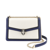 “Serpenti Diamond Blast” shoulder bag in quilted, agate-white nappa leather with Royal Sapphire blue and black calfskin edging and Royal Sapphire blue nappa leather inner lining. Iconic snakehead closure in light gold-plated brass embellished with black and agate-white enamel and black onyx eyes. 922-FQDb image 2