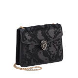 Serpenti Forever small crossbody bag in black Snake Invaders Metropolitan calf leather with a hand-sewn black glass beads embroidery and black nappa leather lining. Captivating snakehead magnetic closure in light gold-plated brass embellished with matte and shiny black enamel scales, and black onyx eyes. 292275 image 2