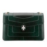 “Serpenti Forever” shoulder bag in Forest Emerald green shiny karung skin with zircon bay gros grain internal lining. Iconic snakehead closure in light gold plated brass and enriched with black and white agate enamel and green malachite eyes. 290564 image 1