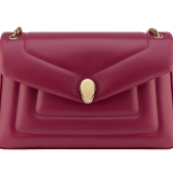 Serpenti Reverse medium shoulder bag in Sahara amber light brown quilted Metropolitan calf leather with taffy quartz pink nappa leather lining. Captivating snakehead magnetic closure in gold-plated brass embellished with red enamel eyes. 1223-MCL image 10