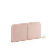 Divas' Dream large wallet in star rose pink goat leather with crystal rose nappa leather interior. Refined gold-plated brass signature charm and zip around closure. DIVA-LONGWLT image 3