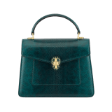 Serpenti Forever medium top handle bag in forest emerald shiny karung with black nappa leather lining. Captivating snakehead magnetic closure in gold-plated brass embellished with forest emerald enamel and gold-plated brass scales, and black onyx eyes. 295626 image 1