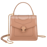 “Serpenti Forever” top-handle bag in agate-white calfskin with a polished, pearly finish and black grosgrain inner lining. Alluring snakehead closure in light gold-plated brass enriched with black and pearly, agate-white enamel and black onyx eyes 1122-VCL image 1