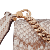 Serpenti Forever Maxi Chain medium crossbody bag in coral carnelian orange Mystical python skin with coral carnelian orange nappa leather lining. Captivating snakehead closure in rose gold-plated brass embellished with mother-of-pearl scales and red enamel eyes. MC-MP-CC image 7