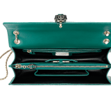 “Serpenti Forever” shoulder bag in emerald green galuchat skin. Iconic snake head closure in light gold plated brass enriched with black enamel, malachite scales and black onyx eyes. 289026 image 4