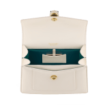 Serpenti Forever medium top handle bag in emerald green calf leather with black nappa leather lining. Captivating snakehead magnetic closure in light gold-plated brass embellished with deep jade intense green enamel and light gold-plated brass scales, and black onyx eyes. SEA-1282-CL image 3
