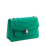 Serpenti Forever medium shoulder bag in black calf leather with emerald green grosgrain lining. Captivating snakehead closure in light gold-plated brass embellished with black and white agate enamel scales and green malachite eyes. 1077-CLa image 2
