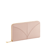 Divas' Dream large wallet in star rose pink goat leather with crystal rose nappa leather interior. Refined gold-plated brass signature charm and zip around closure. DIVA-LONGWLT image 1