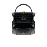 "Serpenti Forever" small maxi chain top-handle bag in black nappa leather, with black nappa leather inner lining. New Serpenti head closure in gold-plated brass, finished with small black onyx scales in the middle, and red enamel eyes. 1133-MCNb image 8