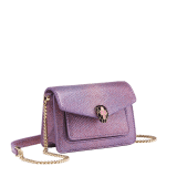Serpenti Forever micro bag in sheer amethyst lilac Gleamy karung skin with primrose quartz pink nappa leather interior. Captivating magnetic snakehead closure in light gold-plated brass embellished with red enamel eyes. 292934 image 1