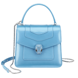 Serpenti Forever top handle bag in Niagara sapphire blue varnished calf leather with black gros grain lining. Captivating snakehead closure in palladium-plated brass embellished with matt Niagara sapphire blue enamel scales and black onyx eyes. 291322 image 1