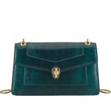 Serpenti Forever medium shoulder bag in forest emerald shiny karung with black nappa leather lining. Captivating snakehead magnetic closure in gold-plated brass embellished with forest emerald enamel and gold-plated brass scales, and black onyx eyes. 295625 image 1