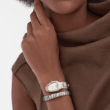 Serpenti Tubogas Studs Capsule single-spiral watch in stainless steel with 18 kt yellow gold diamond-set bezel, 18 kt yellow gold studs on the bracelet, and mother-of-pearl dial. Water-resistant up to 30 metres. Serpenti-Tubogas-Studs-Capsule image 1