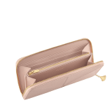 Divas' Dream large wallet in star rose pink goat leather with crystal rose nappa leather interior. Refined gold-plated brass signature charm and zip around closure. DIVA-LONGWLT image 2