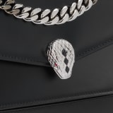 Serpenti Forever Maxi Chain small crossbody bag in black palmellato leather with black nappa leather lining. Captivating snakehead closure in palladium-plated brass embellished with black onyx scales and red enamel eyes. MCN-PL-B image 7