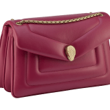 Serpenti Reverse medium shoulder bag in Sahara amber light brown quilted Metropolitan calf leather with taffy quartz pink nappa leather lining. Captivating snakehead magnetic closure in gold-plated brass embellished with red enamel eyes. 1223-MCL image 3