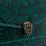 Serpenti Forever medium shoulder bag in Forest Emerald green shiny python skin with black nappa leather lining. Captivating snakehead press button closure in gold-plated brass embellished with black enamel scales, and black onyx eyes. 292580 image 5