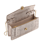 Serpenti Forever chain pochette in milky opal metallic karung with milky opal nappa leather lining. Captivating snakehead magnetic closure in gold-plated brass embellished with foggy opal enamel and black onyx eyes. 294909 image 2