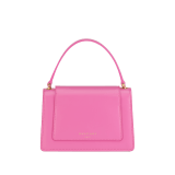 Alexander Wang x Bulgari small belt bag in azalea quartz pink calf leather with black nappa leather lining. Captivating double Serpenti head magnetic closure in antique gold-plated brass embellished with red enamel eyes. 292314 image 3