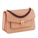 "Serpenti Forever" maxi chain crossbody bag in Ivory Opal white nappa leather, with an Deep Garnet bordeaux nappa leather internal lining. New Serpenti head closure in gold-plated brass, finished with small grey mother-of-pearl scales in the middle, and red enamel eyes. 1138-MCNb image 2