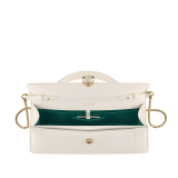 Serpenti Forever Elongated top handle bag in black calf leather with black nappa leather lining. Captivating snakehead magnetic closure in light gold-plated brass embellished with black enamel and light gold-plated brass scales, and black onyx eyes. SEA-001-1390S image 3