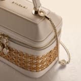 Serpenti Forever jewelry box bag in ivory opal Urban grain calf leather with black nappa leather lining. Captivating snakehead zip pullers and chain strap decors in light gold-plated brass. 1177-UCL image 7