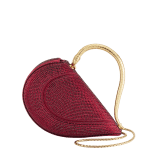 Serpenti Cuore 1968 top handle bag with gold Neige Pavé Crystals applied on a suede base and bright travertino nappa internal lining. Captivating snake body-shaped top handle in gold-plated brass embellished with engraved scales and zirconia eyes; press-button closure. SRN-001-1367S-CRYS image 4