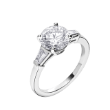 Griffe ring in platinum with round brilliant cut diamond and 2 side diamonds. Available from 1 ct. 331636 image 2