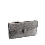 "Serpenti Forever" card holder in Milky Opal beige metallic karung skin and Milky Opal beige calf leather. Light gold-plated brass iconic snakehead stud closure enamelled in black and glittery Milky Opal beige, with black enamel eyes. SEA-CC-HOLDER-ZIP-MK image 1