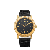BULGARI BULGARI watch with mechanical automatic in-house movement, 18 kt yellow gold case and bezel engraved with double logo, black opaline dial and black alligator bracelet. Water resistant up to 50 meters 103967 image 1