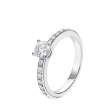 Griffe solitaire ring in platinum with a round brilliant cut diamond and pavé diamonds 340252 image 1