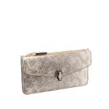 "Serpenti Forever" card holder in Milky Opal beige metallic karung skin and Milky Opal beige calf leather. Light gold-plated brass iconic snakehead stud closure enamelled in black and glittery Milky Opal beige, with black enamel eyes. SEA-CC-HOLDER-ZIP-MK image 1