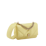 "Serpenti Cabochon" maxi chain crossbody mini bag in soft quilted Ivory Opal white calf leather, with a maxi graphic motif, and black nappa leather internal lining. New Serpenti head closure in gold-plated brass, finished with small white mother-of-pearl scales in the middle, and red enamel eyes. 1164-MSMa image 2