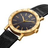 BULGARI BULGARI watch with mechanical automatic in-house movement, 18 kt yellow gold case and bezel engraved with double logo, black opaline dial and black alligator bracelet. Water resistant up to 50 meters 103967 image 2