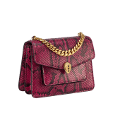 Serpenti Forever Maxi Chain small crossbody bag in soft, shiny anemone spinel pinkish red python skin with black nappa leather lining. Captivating magnetic snakehead closure in gold-plated brass embellished with black onyx scales and red enamel eyes. 1134-SSP image 2