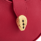 Serpenti Ellipse micro crossbody bag in soft drummed and smooth flamingo quartz pink calf leather with flamingo quartz pink gros grain lining. Captivating snakehead closure in gold-plated brass embellished with red enamel eyes. Online exclusive colour. SEA-MICROHOBOb image 4