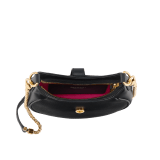 Serpenti Ellipse small crossbody bag in Urban grain and smooth ivory opal calf leather with flamingo quartz pink gros grain lining. Captivating snakehead closure in gold-plated brass embellished with black onyx scales and red enamel eyes. 1204-UCL image 4