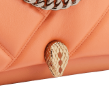 "Serpenti Cabochon" small maxi chain crossbody bag in soft quilted Blush Quartz pink calf leather, with a maxi graphic motif, and Deep Garnet burgundy nappa leather internal lining. New Serpenti head closure in gold plated brass, finished with small pink mother-of pearl scales in the middle and red enamel eyes. 1165-NSM image 5